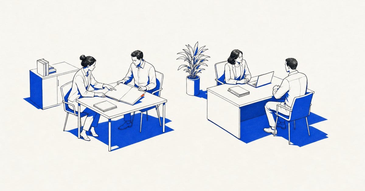 Colleagues work through a folder at one table while a consultant meets a client at another.